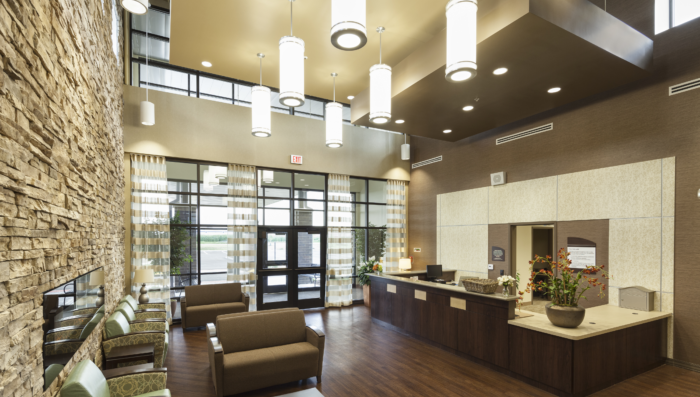 Interior shot of the Beckett Springs lobby including waiting area with chairs and reception desk.